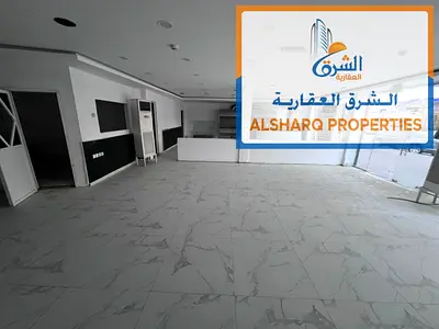 Shop for annual rent in Al Rashidiya 1 Excellent location next to Ramada Hotel Area: 180 square meters Includes a kitchen and bathroom Large shopfront