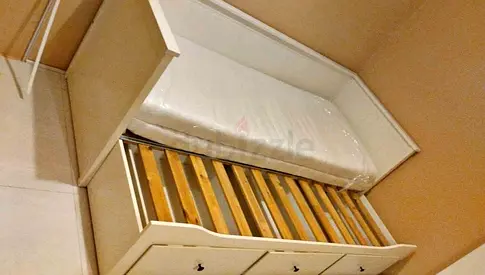 IKEA hamnes day bed with 3 big storage drawers underneath and with 2 IKEA mattresses is available