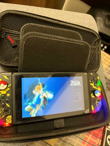 Nintendo Switch version 2 console with LED lights wireless controller/ grip (final price )