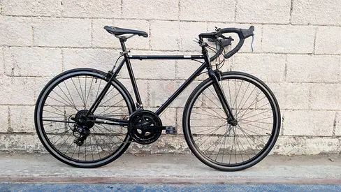Used black road bike - 21 speed, drop handlebars, good condition