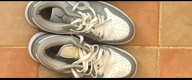Used Nike Air Jordan low top sneakers - size approx EU 42US 7.5 (grey white)