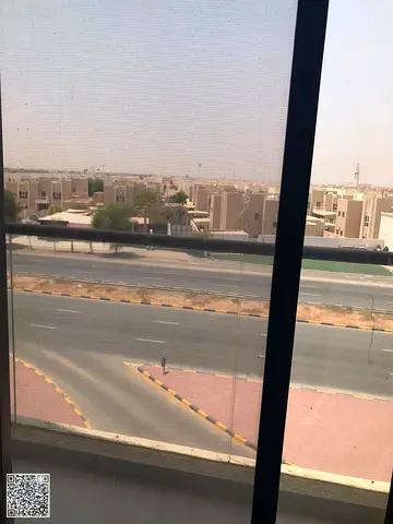 Two-bedroom apartment for annual rent in Al-Aliya area, first occupancy, in a prime location on a main street.