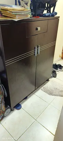 Dark wood shoe cabinet with drawer - good condition everyone will like good quality