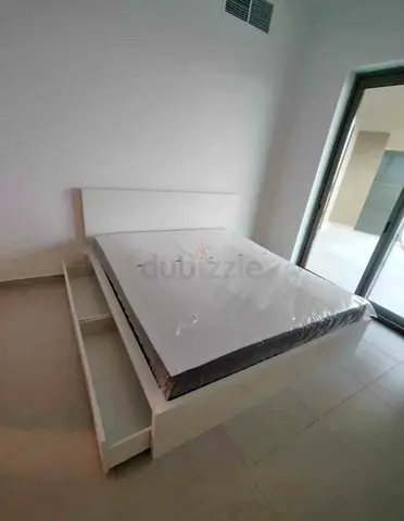 IKEA Malam king size bed 180/200cm with 2 storage drawers underneath and Ikea mattress is available
