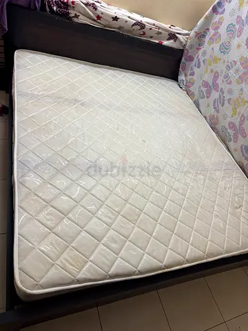 Bed with mattress