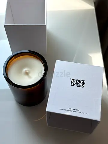 Voyage Epices scented candle in amber glass — lightly used
