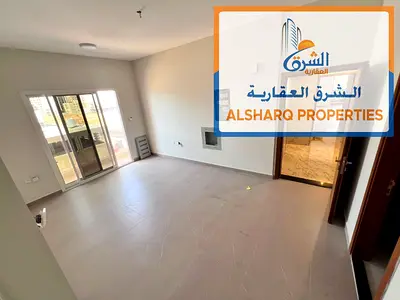 Two-bedroom apartment with a living room, first occupancy, for annual rent in Al Jurf 3 - Ajman, near the Chinese Market and Tribal Center.