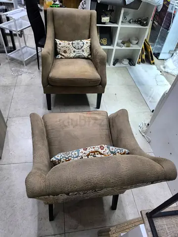 Pair of beige fabric accent chairs with cushions - good condition