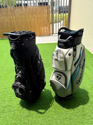 Two golf bags (TaylorMade and Callaway cart bags) in good condition