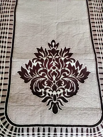 Beige and Brown Decorative Area Rug with Central Floral Motif