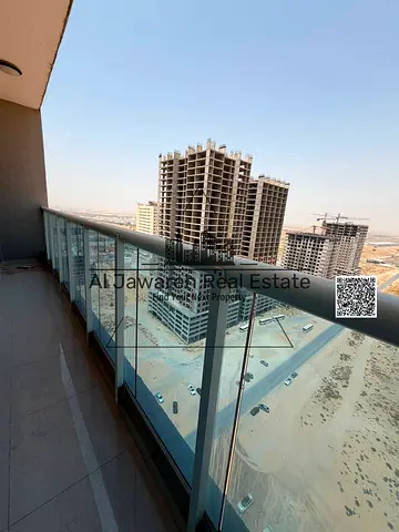 Two bedrooms, a living room, a balcony, parking, and an open view. Al-Amirah