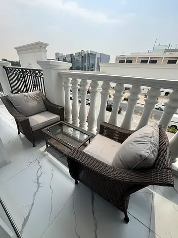 4-piece outdoor rattan garden seating set with cushions and coffee table