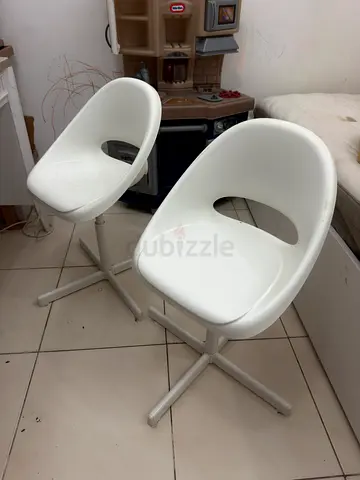 Set of 2 white plastic swivel Kids chairs with metal base