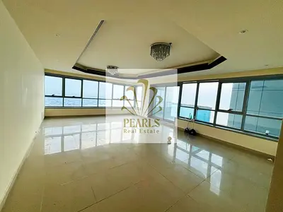 Luxurious 2BR apartment in Corniche Tower with sea view, balcony, 3 baths, free AC, gym, pool & parking. Rent AED 70K, 4 payments, cheque deposit.