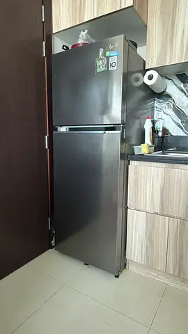 LG Silver Two-Door Refrigerator - Good Working Condition