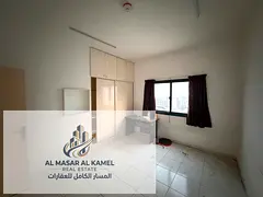 2-Bedroom Apartment in Abu Shagara Near Cooperative Society with Built-In Wardrobes, Suitable for Fa