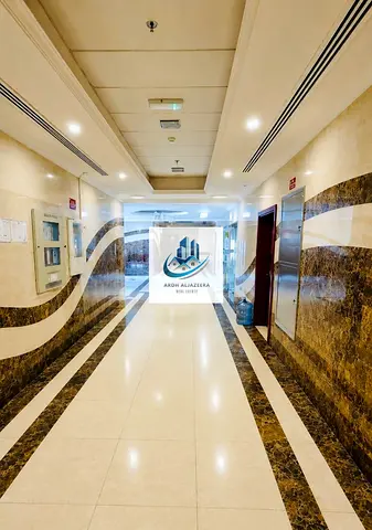 Premium class 1bhk in Fully Family building🏢 Near Sahara center Al nahda Sharjah 1Room with cupboard and close Hall premium kitchen with new woodish cabnots perfect for families