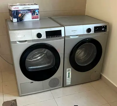 Siemens front-load washer and condenser dryer set - silver, good condition