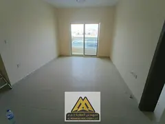 1BR in Al Rawda 2, 2 balconies, 1 bath, closed kitchen, central AC, free maintenance, AED 30K.