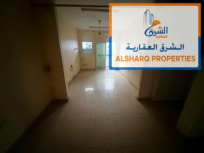 The most beautiful and spacious apartments - two bedrooms and a living room - price 30,000 dirhams annually - second row from Ajman Corniche
