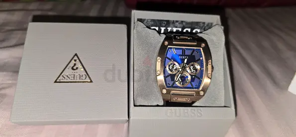 Guess Gen watch with blue yellow Gold case quartz. In original box. Never used.