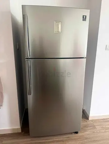 Samsung refrigerator 720 liter capacity top mount top mount freezer neat and clean perfect working