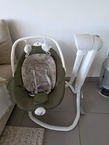 Compact electric baby swing with cushioned seat - excellent condition