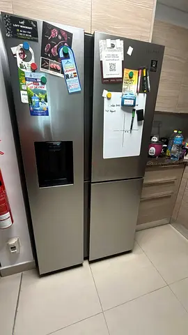 Samsung Stainless Steel Side-by-Side Refrigerator with Water Dispenser