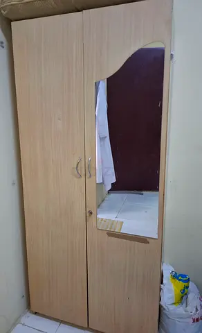 Two-door wooden wardrobe with built-in mirror - light oak finish