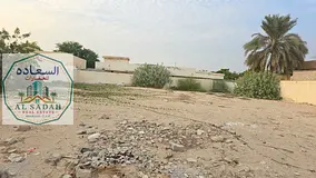 Land for sale in Al-Shahbaa, 8000 sq ft, on an 18-meter wide street. Asking price: 850,000