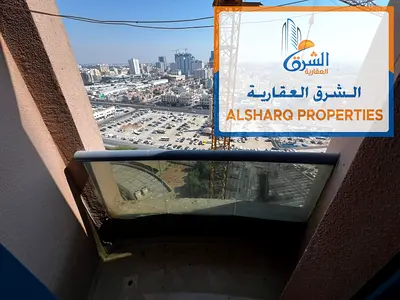 Studio apartment for annual rent with balcony, private parking, central air conditioning, suitable for families, maintenance included, close to all se