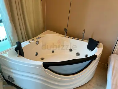 Corner Whirlpool/Jacuzzi Bath Tub with Dual Headrests - Excellent Condition