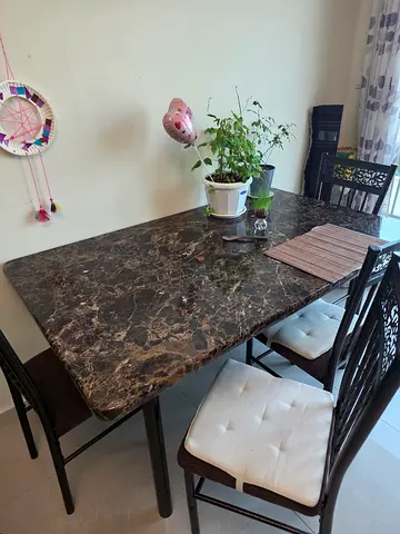 Marble-like top dining table with 4 chairs - good condition