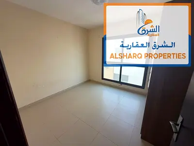 3BR Apartment with Private Roof in Al Jurf 2, Master Bedroom, 3 Bathrooms, Built-in Wardrobes and Central AC.