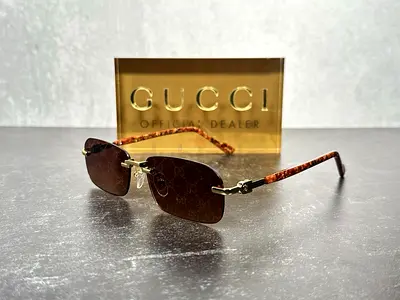 GuccCi rimless brown logo sunglasses - preowned