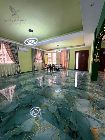 A luxurious villa for rent in Ajman with a very spacious area and highend finishes featuring 5 master bedrooms two living rooms a large majlis a maid'