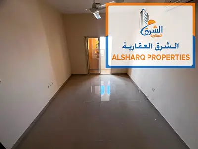 Balcony with an open view - Master bedroom - Spacious - Prime location near all amenities - Easy access to Sharjah and Dubai