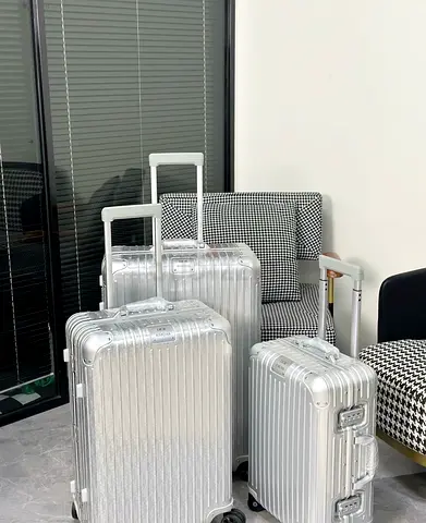 Dior x Rimowa Luggage’s aluminum set
