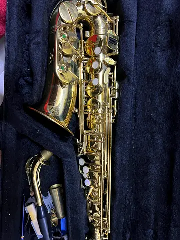 Alto saxophone with case and mouthpiece - good working condition