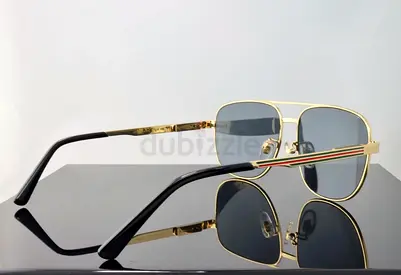 Gold-frame Aviator Sunglasses with Dark Lenses