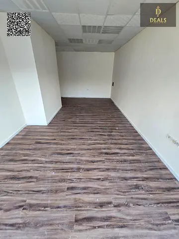 **Prime Commercial Shop for Annual Rent in Al Rashidiya – Main Road Location**