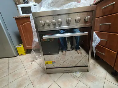 Stainless Steel Freestanding Cooker with Oven - Good Working Condition