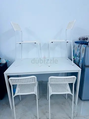 Set of 4 White Plastic Dining Chairs - Lightweight and Stackable
