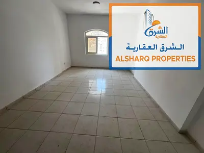 Studio apartment with a semi-detached kitchen, built-in wardrobes, central air conditioning, and easy access to Sharjah and Dubai.