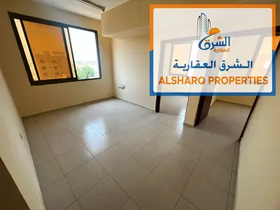 Two bedrooms and a living room - AED 30,000 per year - 2 bathrooms - Central air conditioning - Al Nuaimiya 2 - Ajman - Easy access to Dubai and Sharj