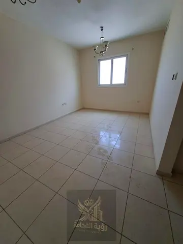 Annual rental in Al Qulayaa one bedroom apartment master bedroom two bathrooms central AC central gas second tenant rent 32000 AED payment 4 or 6 inst