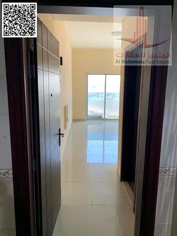 A prime residential apartment is available for annual rent in Al Rawda 2, Ajman. Featuring central