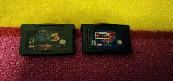 2x Game Boy Advance cartridges: Super Street fighter and Final Fight