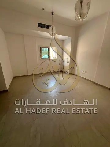 One bedroom and living room apartment, first occupancy in Al Butina, 2 bathrooms, spacious, central