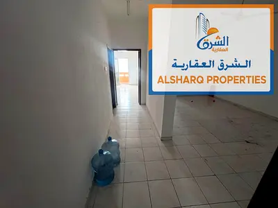 **Annual Rent - 2 Bedrooms and Living Room | Second Row from Ajman Corniche** A distinctive apartment in a prime location on the **second row from Aj